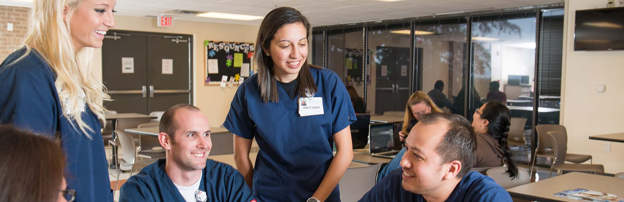 academics-banner-2000x650 students sharing a laugh